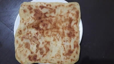 Baked Flat Bread In White Plate